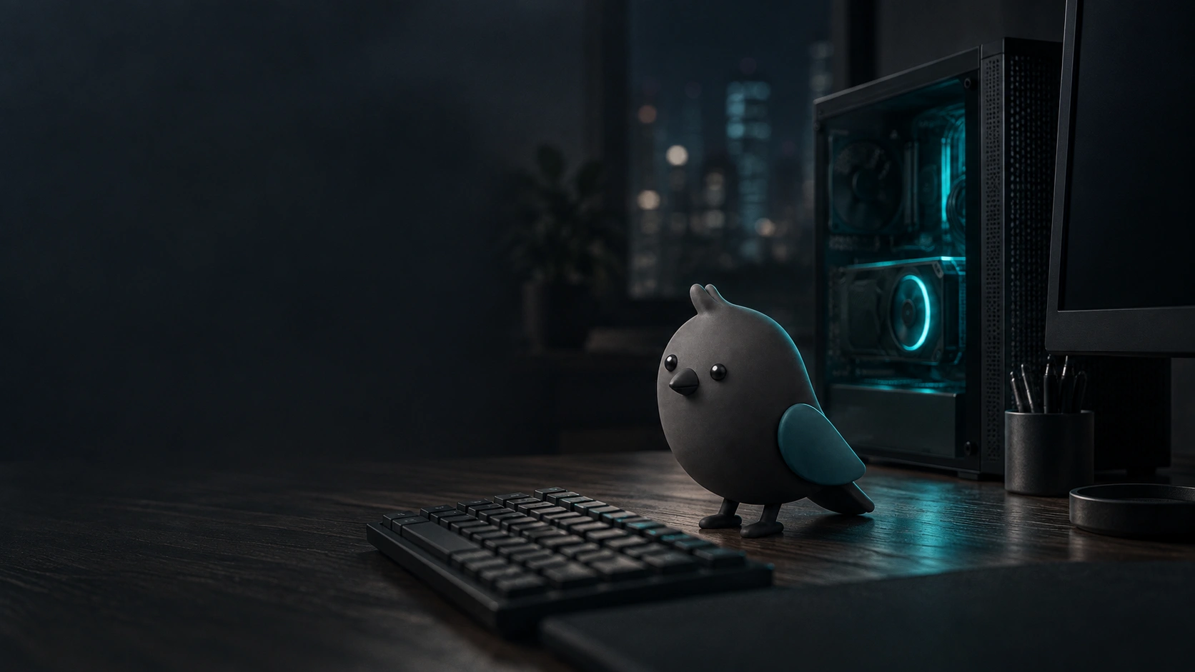 Nachts am Schreibtisch: der Microo-Vogel steht neben der Tastatur, im PC leuchtet die Grafikkarte petrolfarben.
